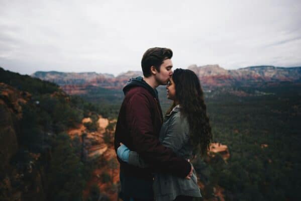 happy couple in love in wild nature